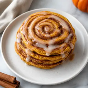 Spiced Pumpkin Cinnamon Roll Pancakes